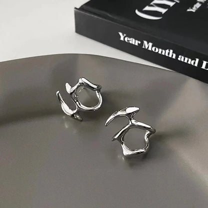 Boucle d'oreilles abstraite
