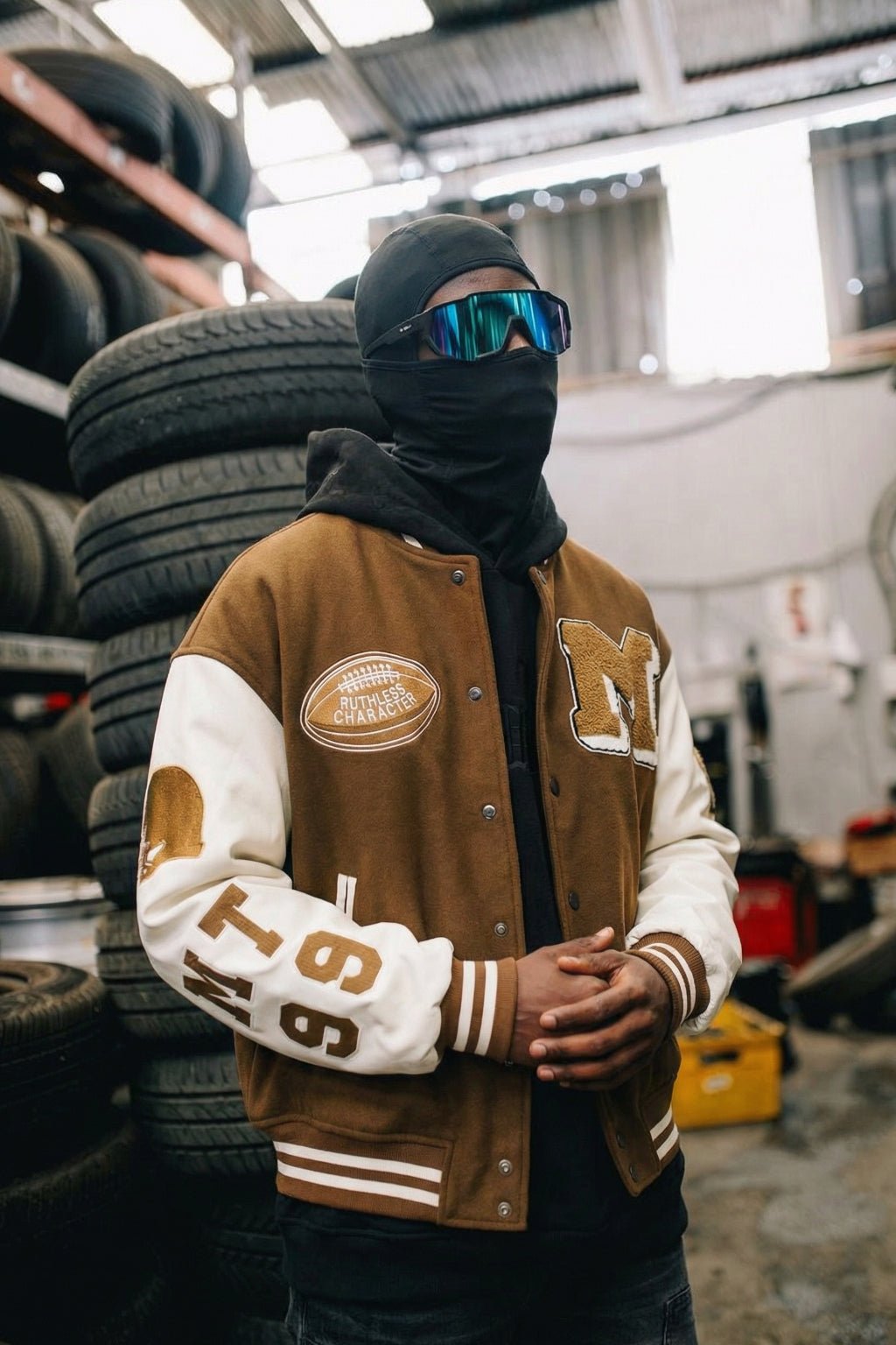 Brown varsity jacket