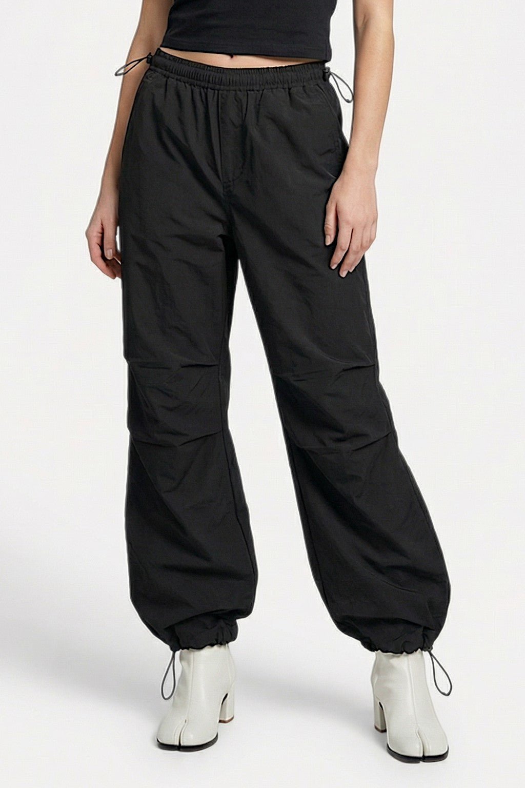 Black parachute pants