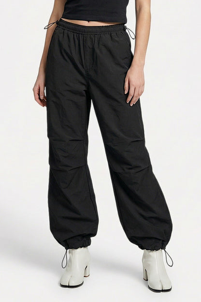 Black parachute pants