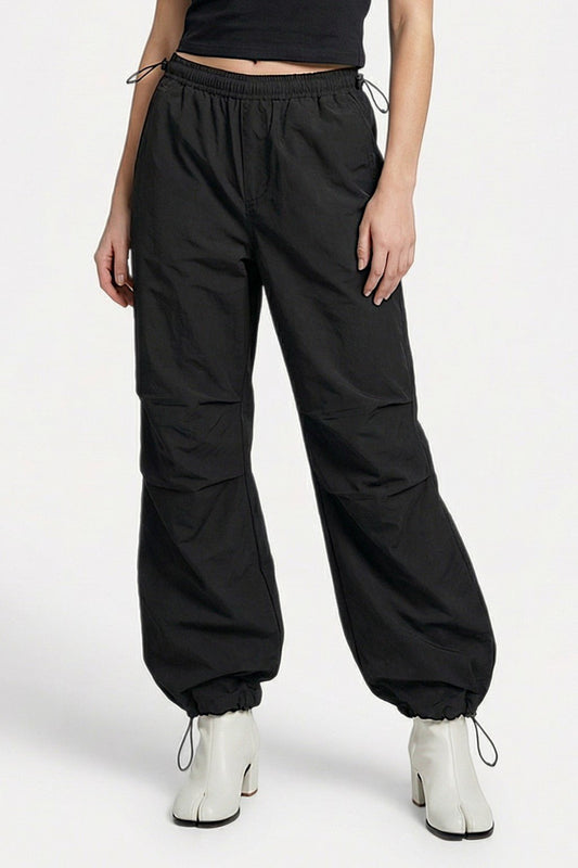 Black parachute pants