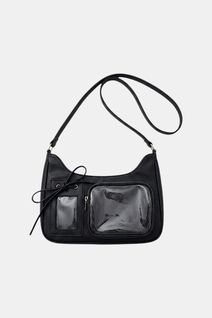 Handbag with transparent panel