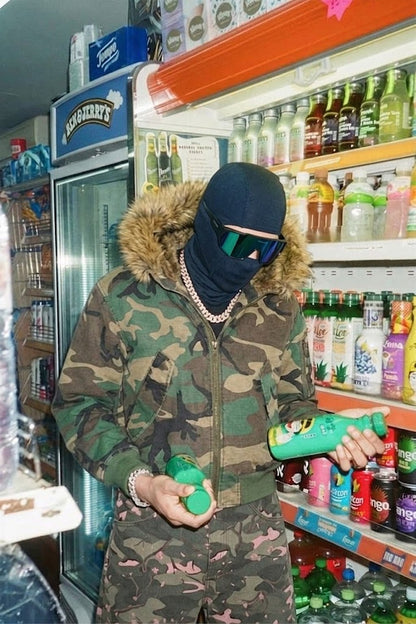 Camouflage jacket with fur hood
